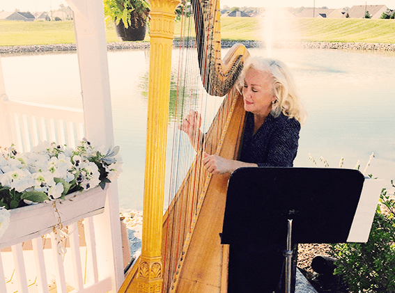 Candlewood Strings performer playing a harp