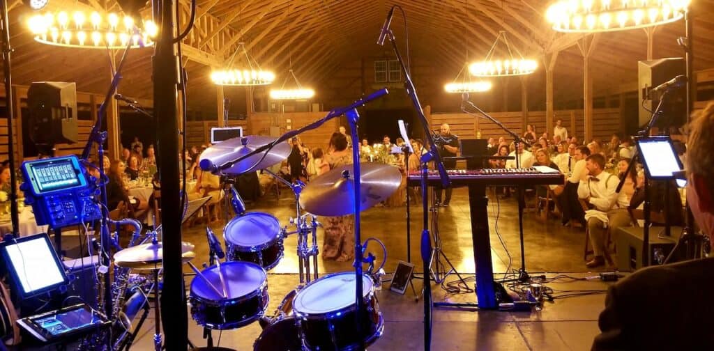 The band etc... plays at Saxony Farm during a wedding