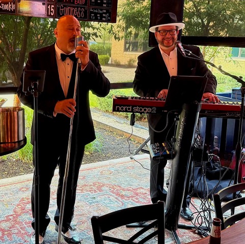 Mr. Nick Lemmonti (Left) and Mr. Bobby Stardust (Right) perform as Jacket Required
